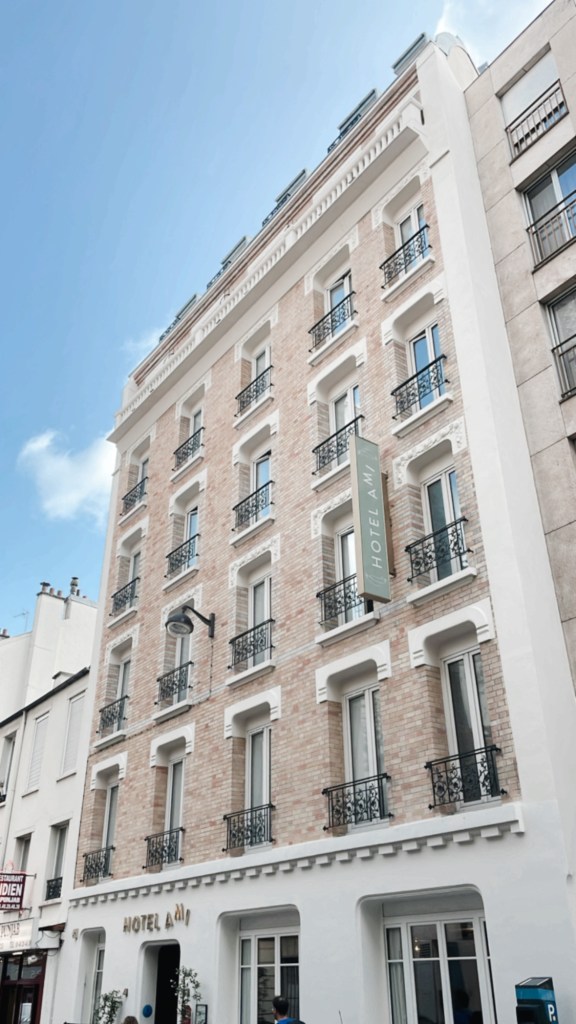 solo trip Paris hotel Ami facade
